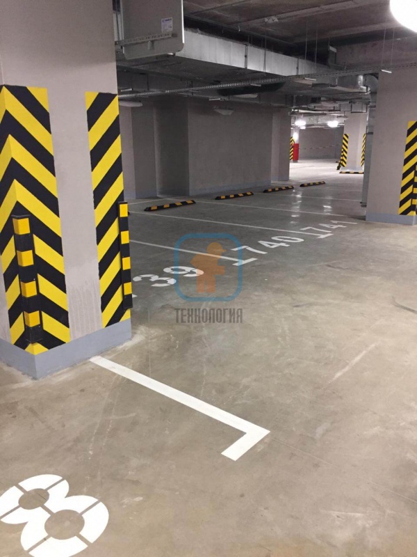Нанесение разметки и установка парковочного оборудования для безопасного движения по подземному паркингу ЖК «ЗИЛАРТ»